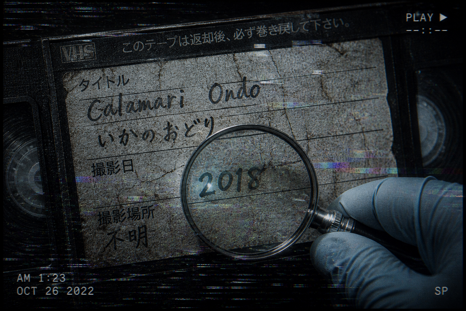 Close-up of a forensic investigation into a cracked VHS tape labeled Calamari Ondo with analog noise.